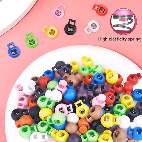 Kordelstopper aus Kunststoff mit zwei Löchern